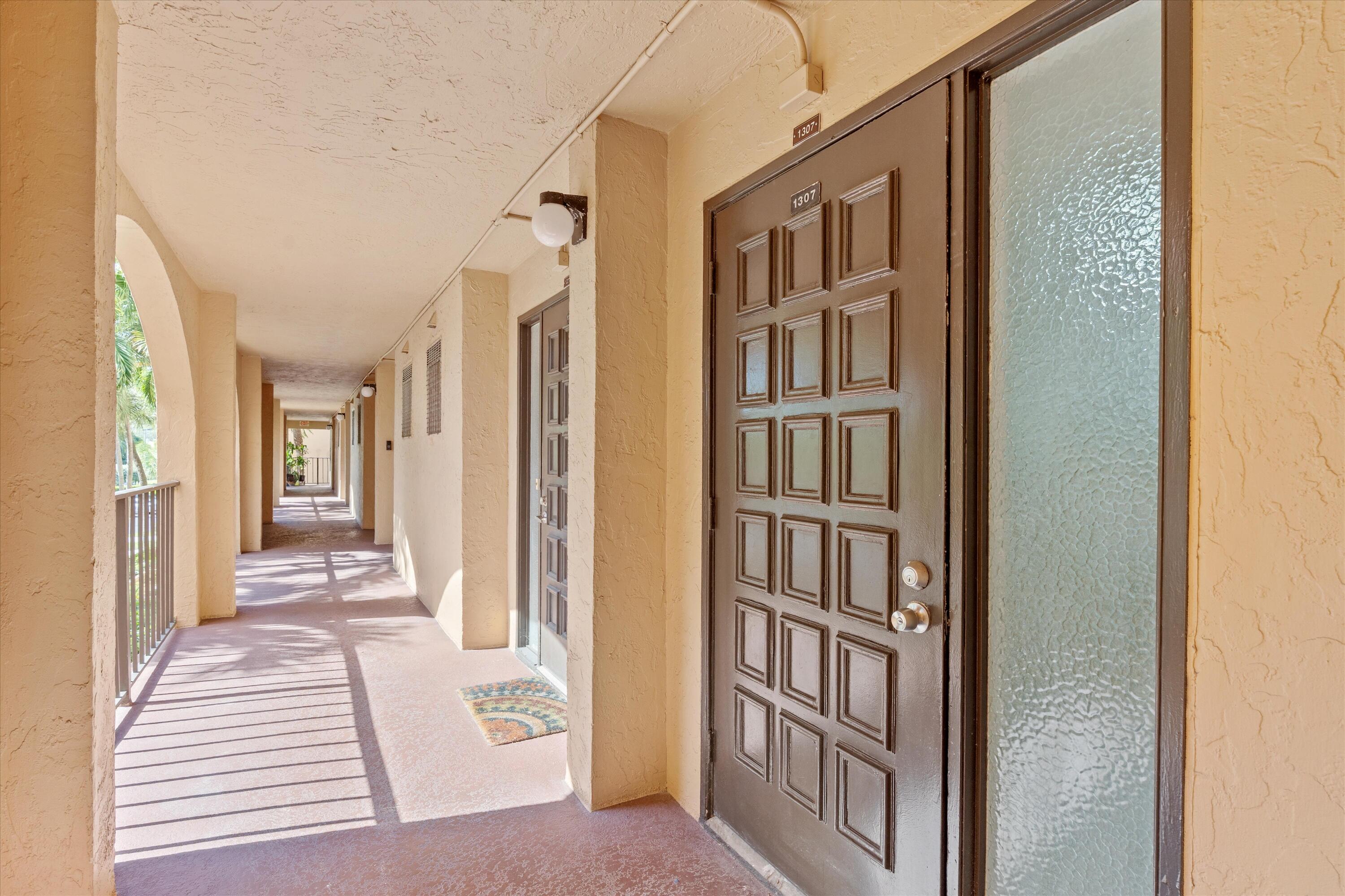 755 Dotterel Road, Unit 1307 Delray Beach, FL 33444 - Photo 22 of 36 a view of a living room and entry way