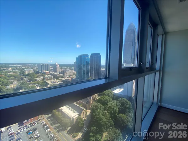a city view with tall buildings