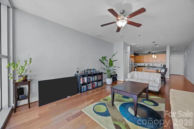 a workspace with furniture and wooden floor