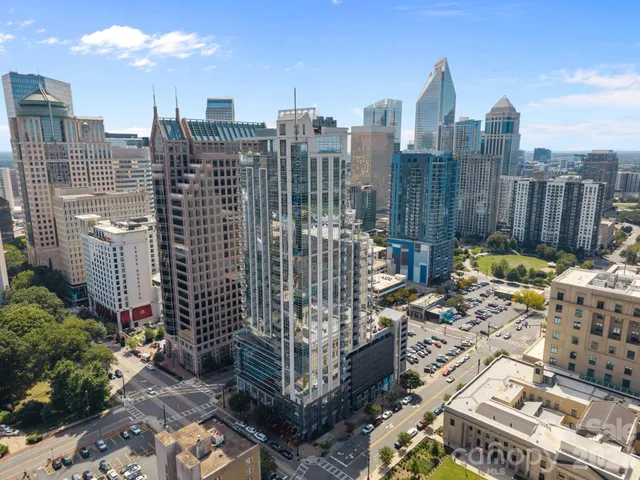 a view of city with tall buildings