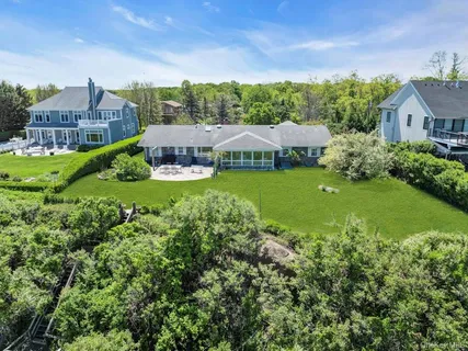 an aerial view of a house with garden