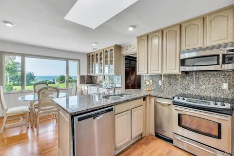 a bedroom with double bed and a window