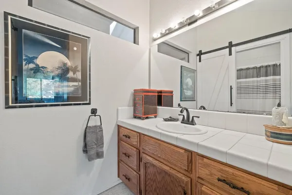 a bathroom with a sink and toilet