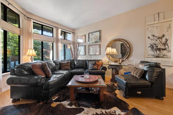 a living room with furniture and a table