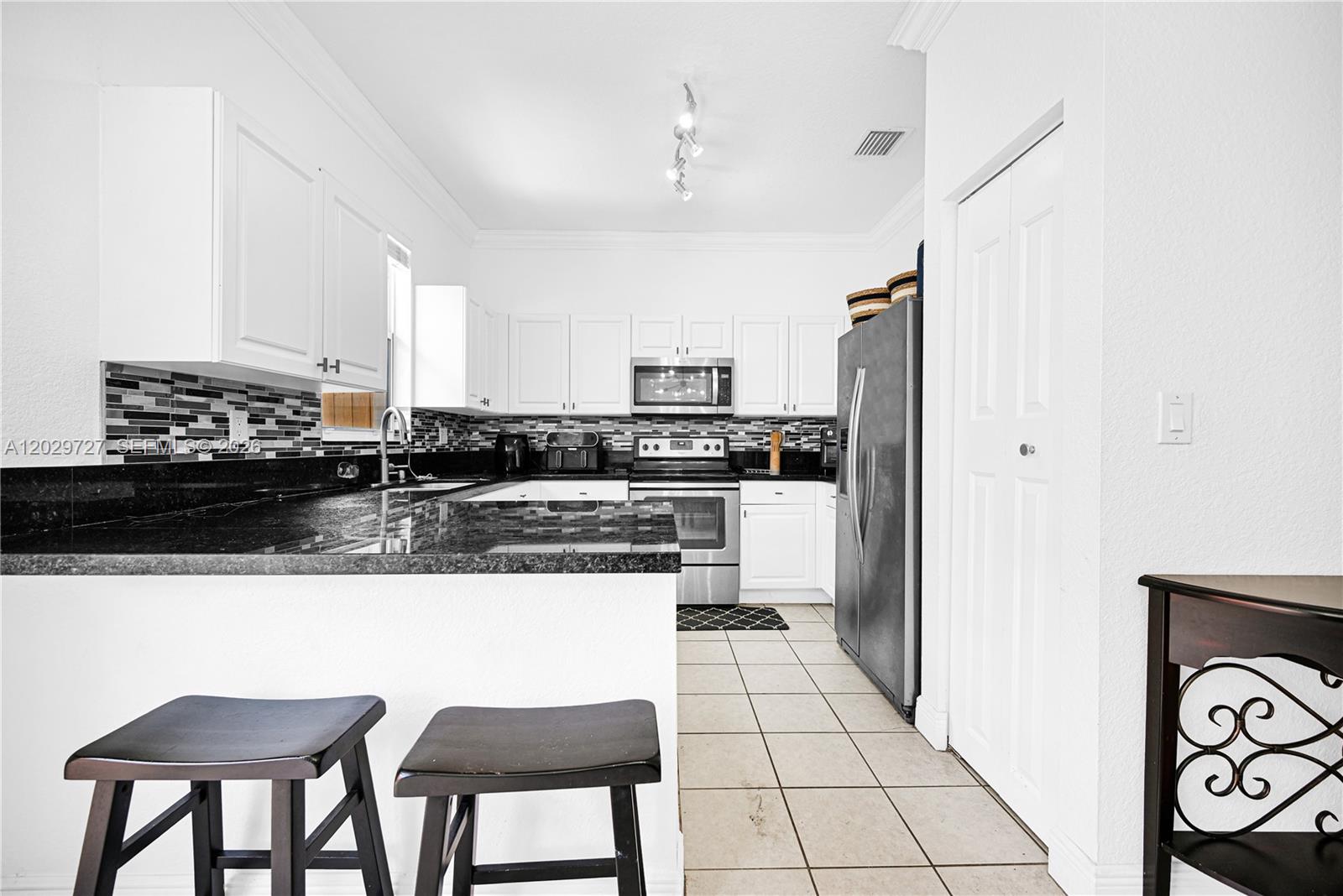12857 Southwest 134th Street Miami, FL 33186 - Photo 15 of 57
