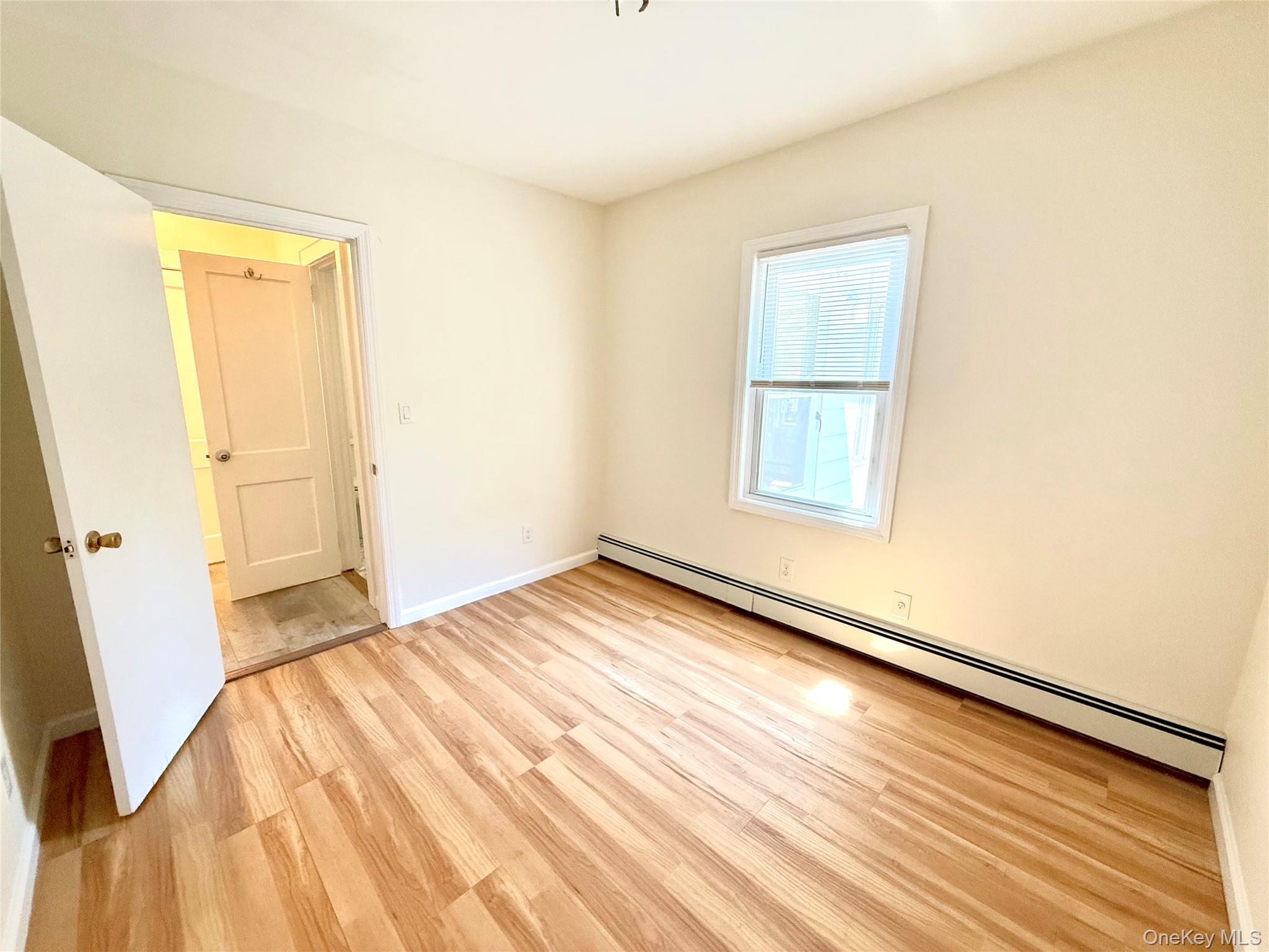55 Red Mill Road Cortlandt Manor, NY 10567 - Photo 14 of 20 a view of empty room with wooden floor