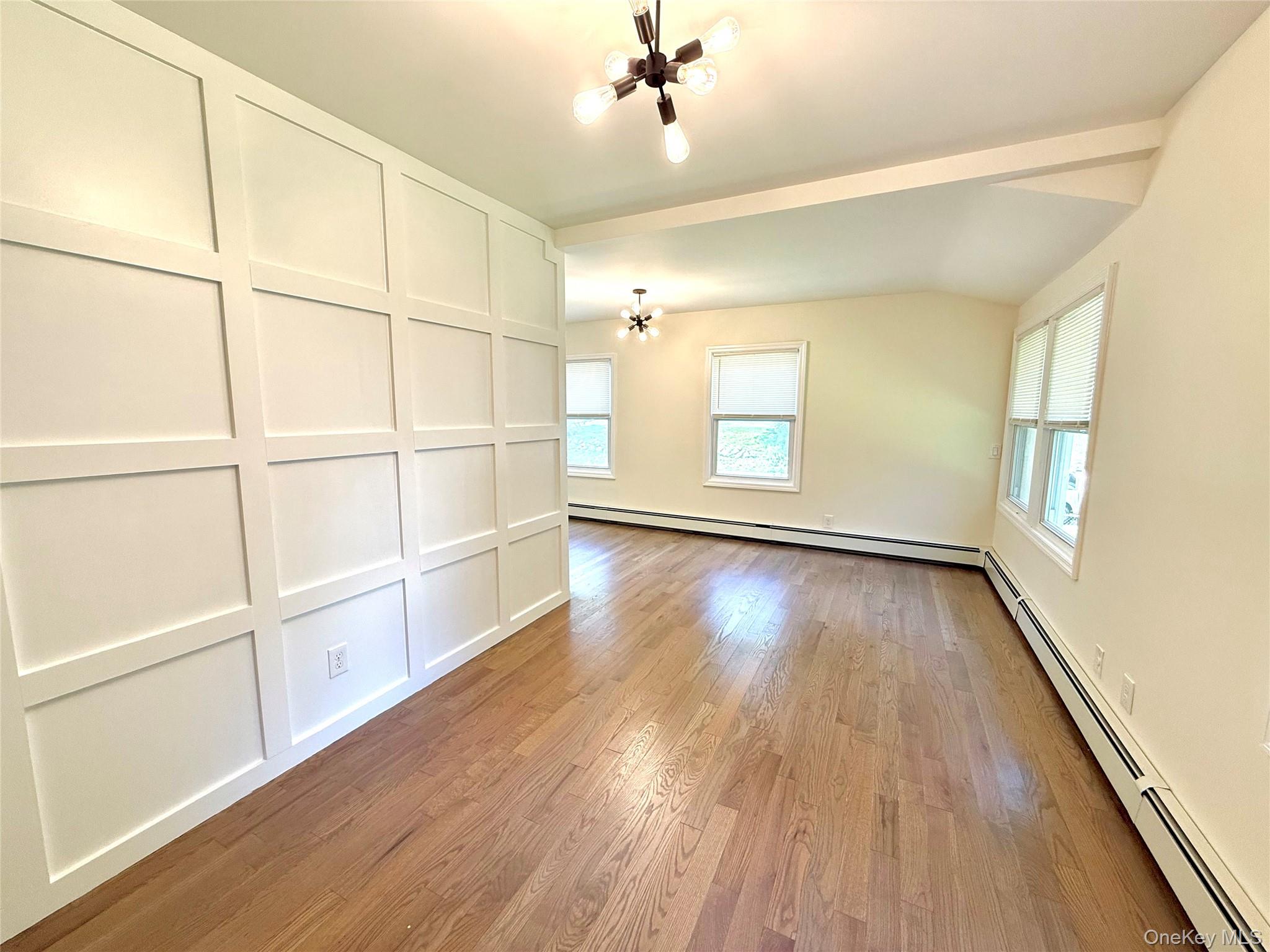 55 Red Mill Road Cortlandt Manor, NY 10567 - Photo 8 of 20 wooden floor in an empty room with a window