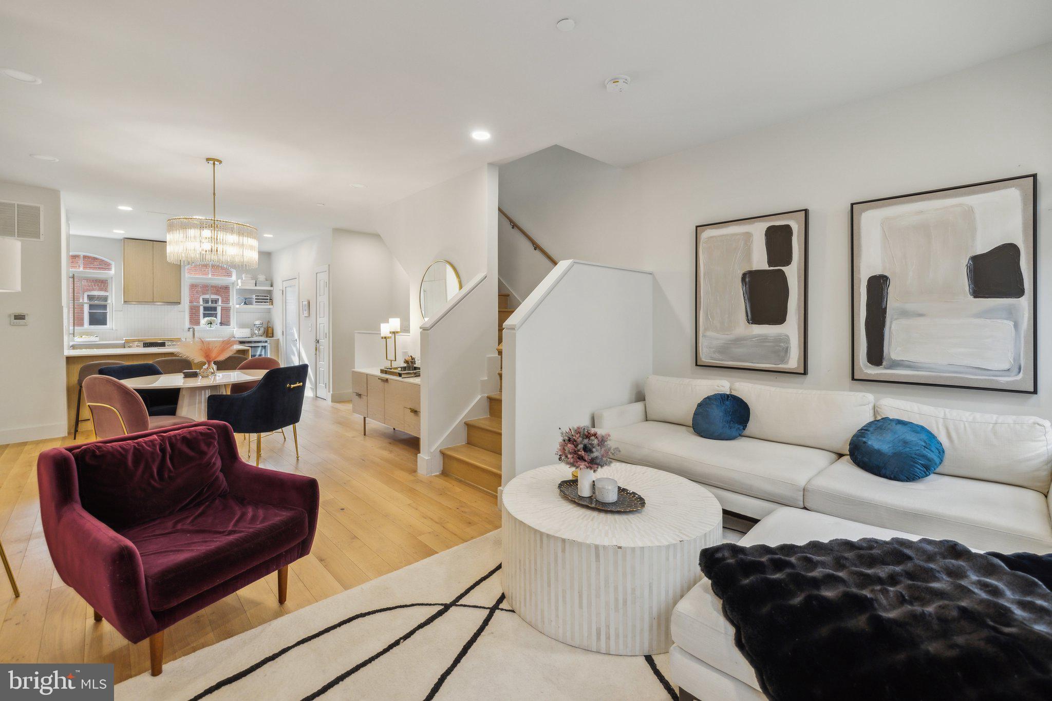 1309 E Street Southeast, Unit 36 Washington, DC 20003 - Photo 11 of 36 a living room with furniture and a rug