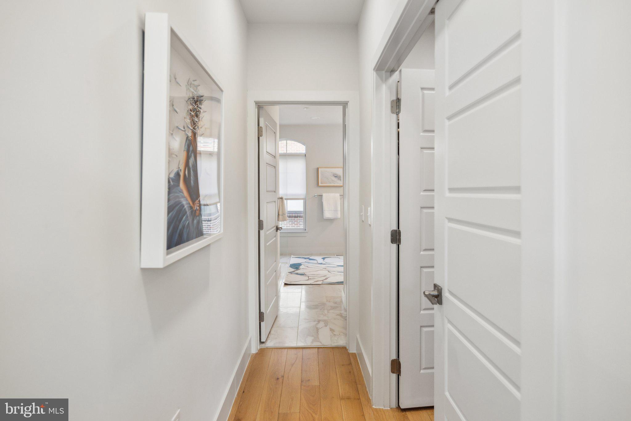 1309 E Street Southeast, Unit 36 Washington, DC 20003 - Photo 16 of 36 a view of a hallway with wooden floor and staircase