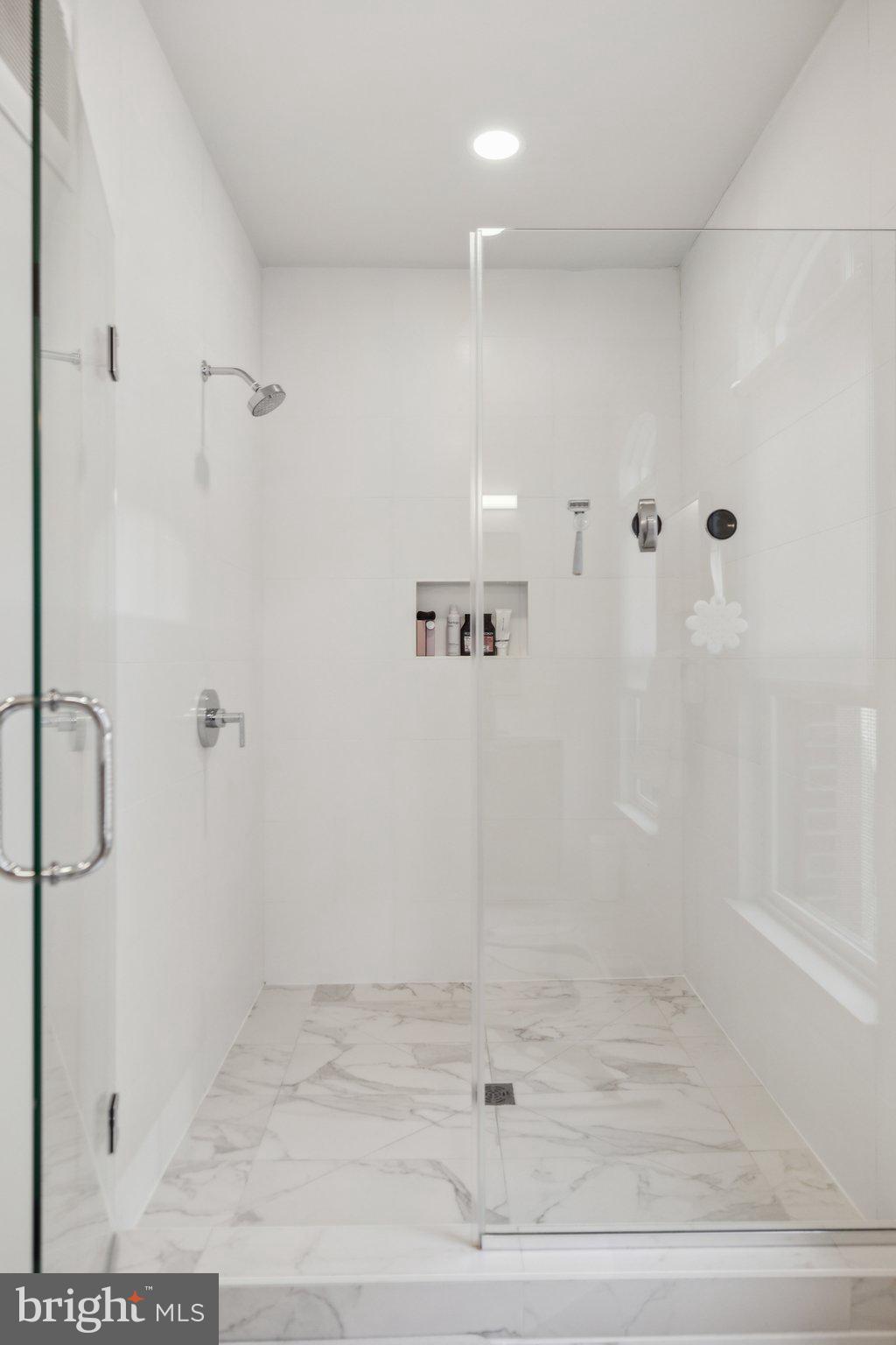 1309 E Street Southeast, Unit 36 Washington, DC 20003 - Photo 19 of 36 a bathroom with a shower