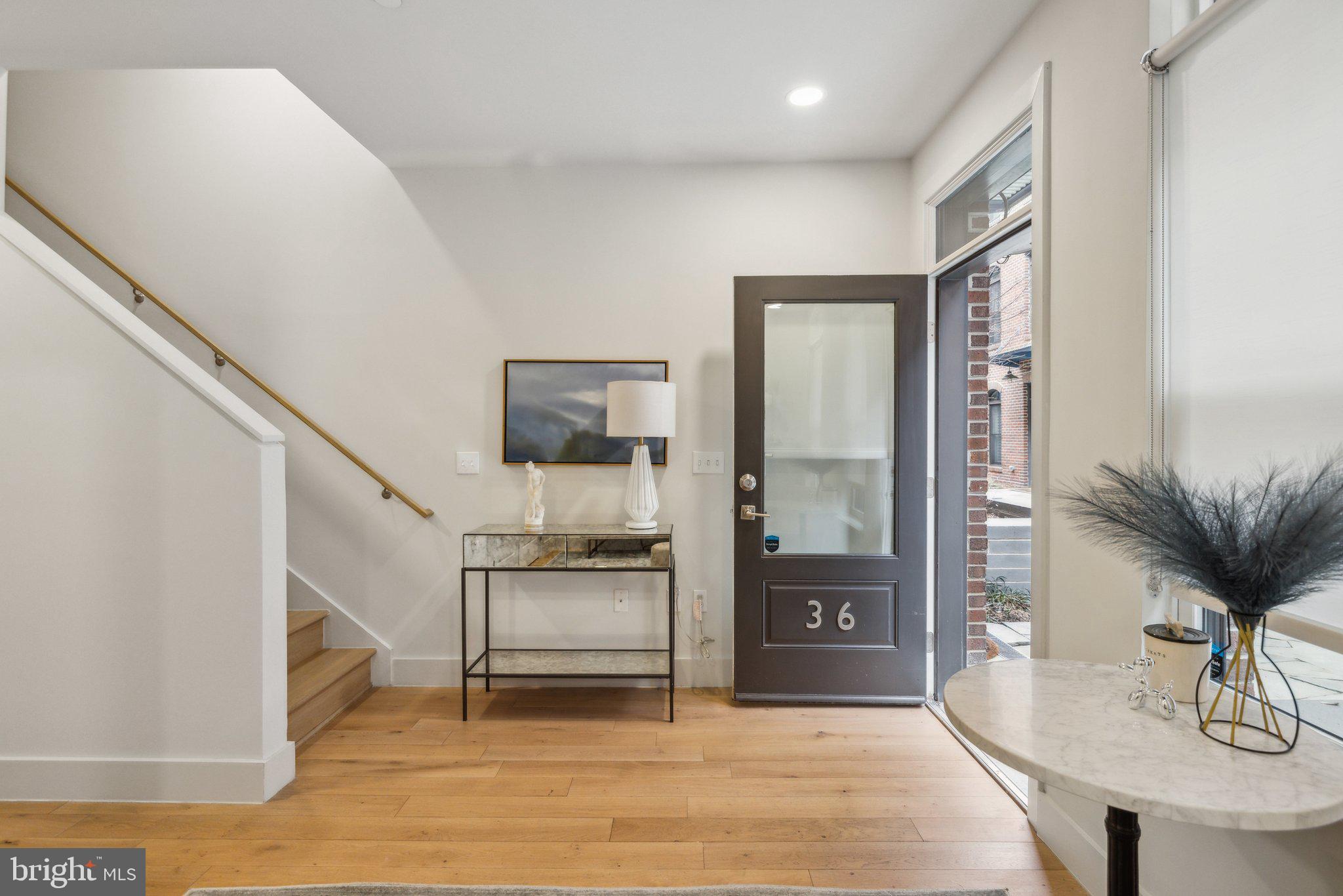 1309 E Street Southeast, Unit 36 Washington, DC 20003 - Photo 2 of 36 a view of livingroom with furniture and wooden floor