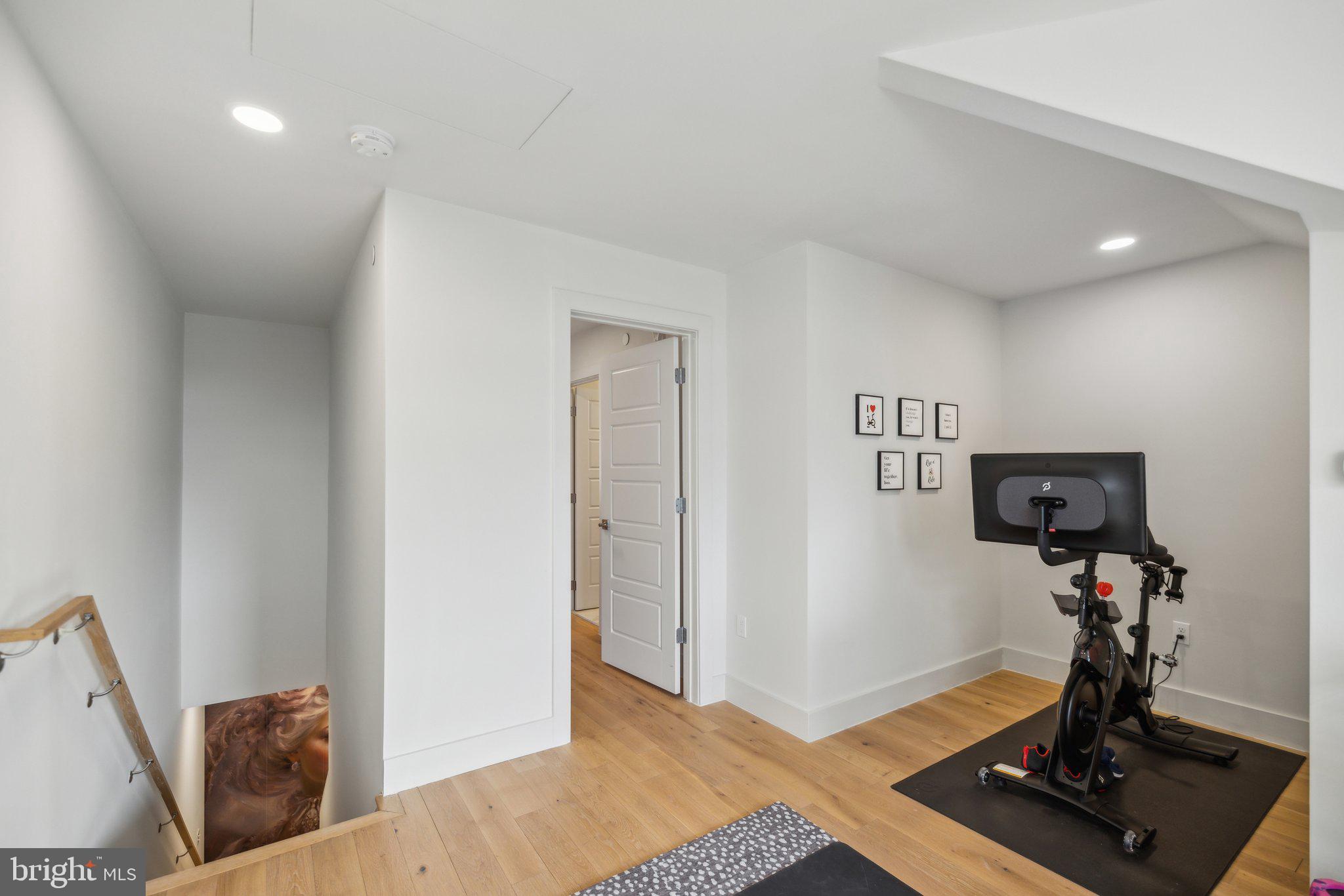 1309 E Street Southeast, Unit 36 Washington, DC 20003 - Photo 23 of 36 a view of a room with gym equipment
