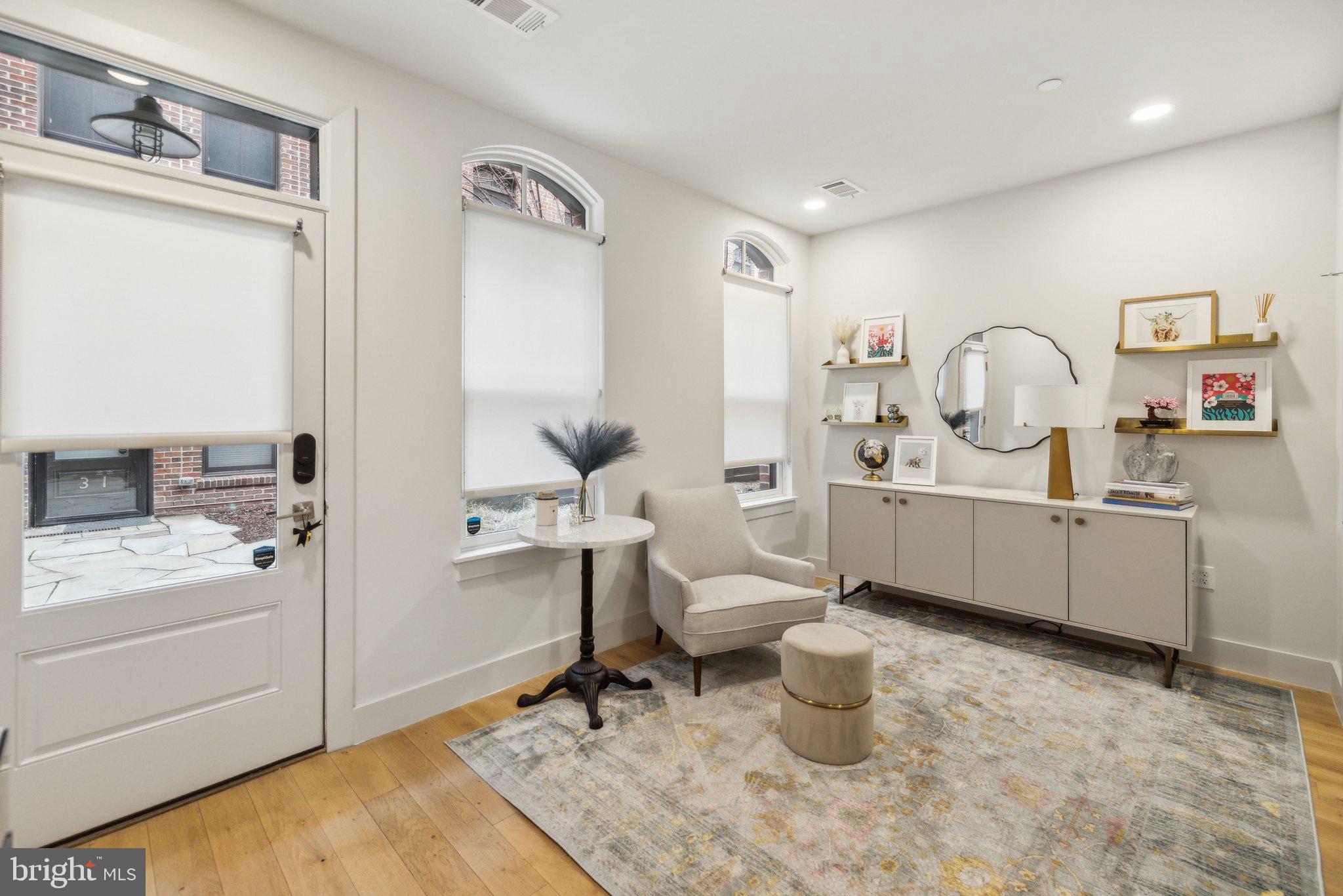 1309 E Street Southeast, Unit 36 Washington, DC 20003 - Photo 25 of 36 a room with a sink and a toilet