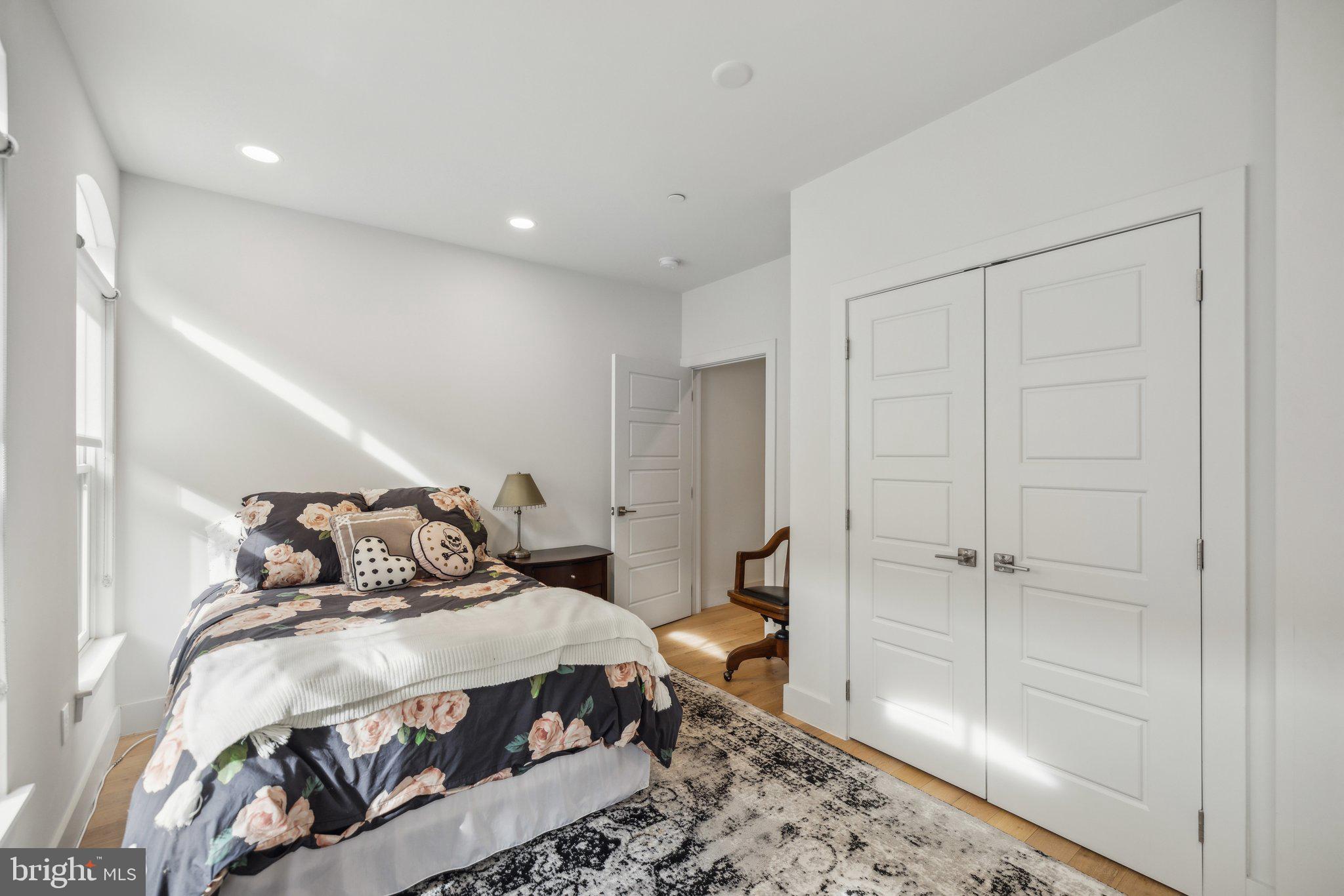 1309 E Street Southeast, Unit 36 Washington, DC 20003 - Photo 30 of 36 a bedroom with a bed and a dresser