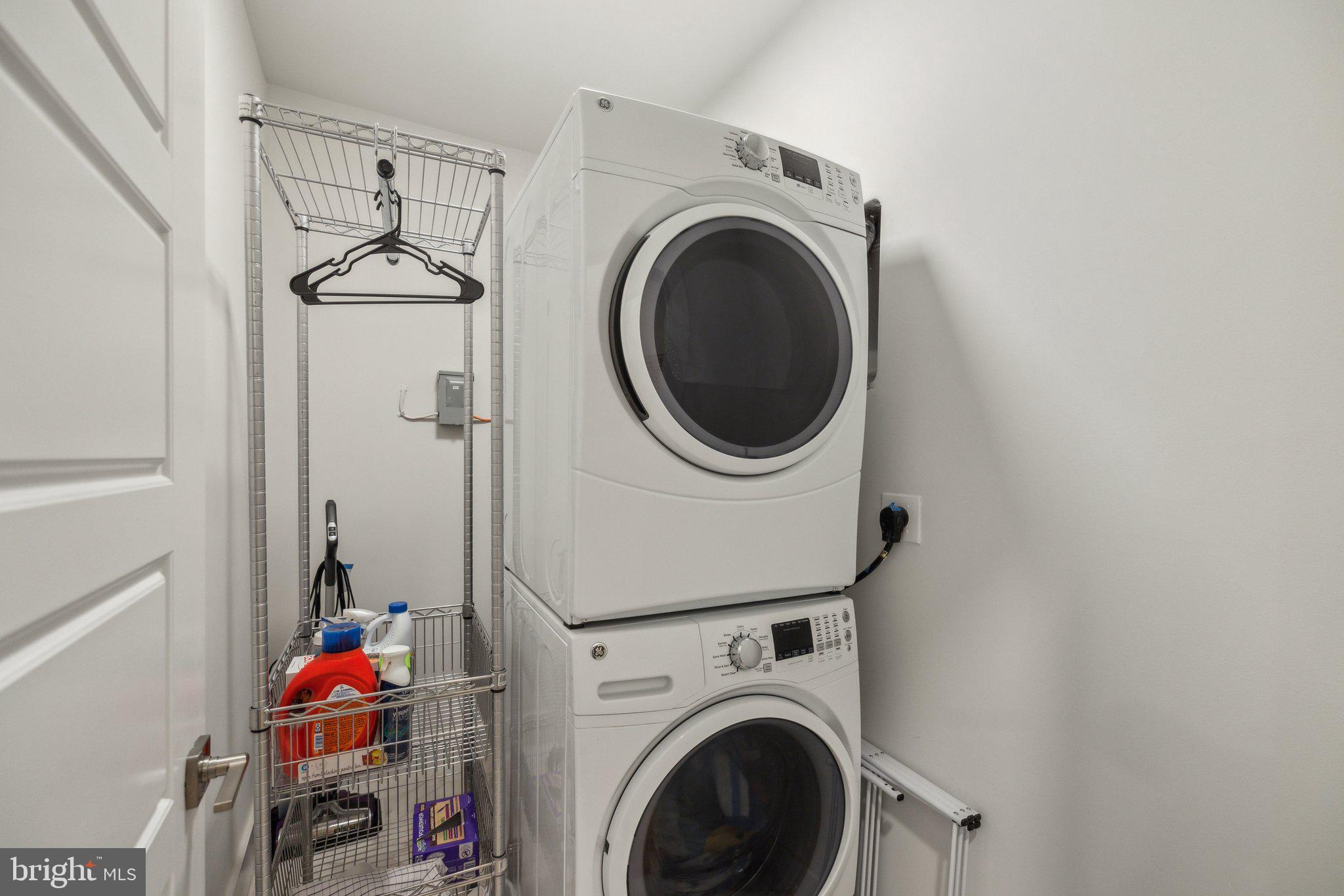 1309 E Street Southeast, Unit 36 Washington, DC 20003 - Photo 32 of 36 a utility room with dryer and washer