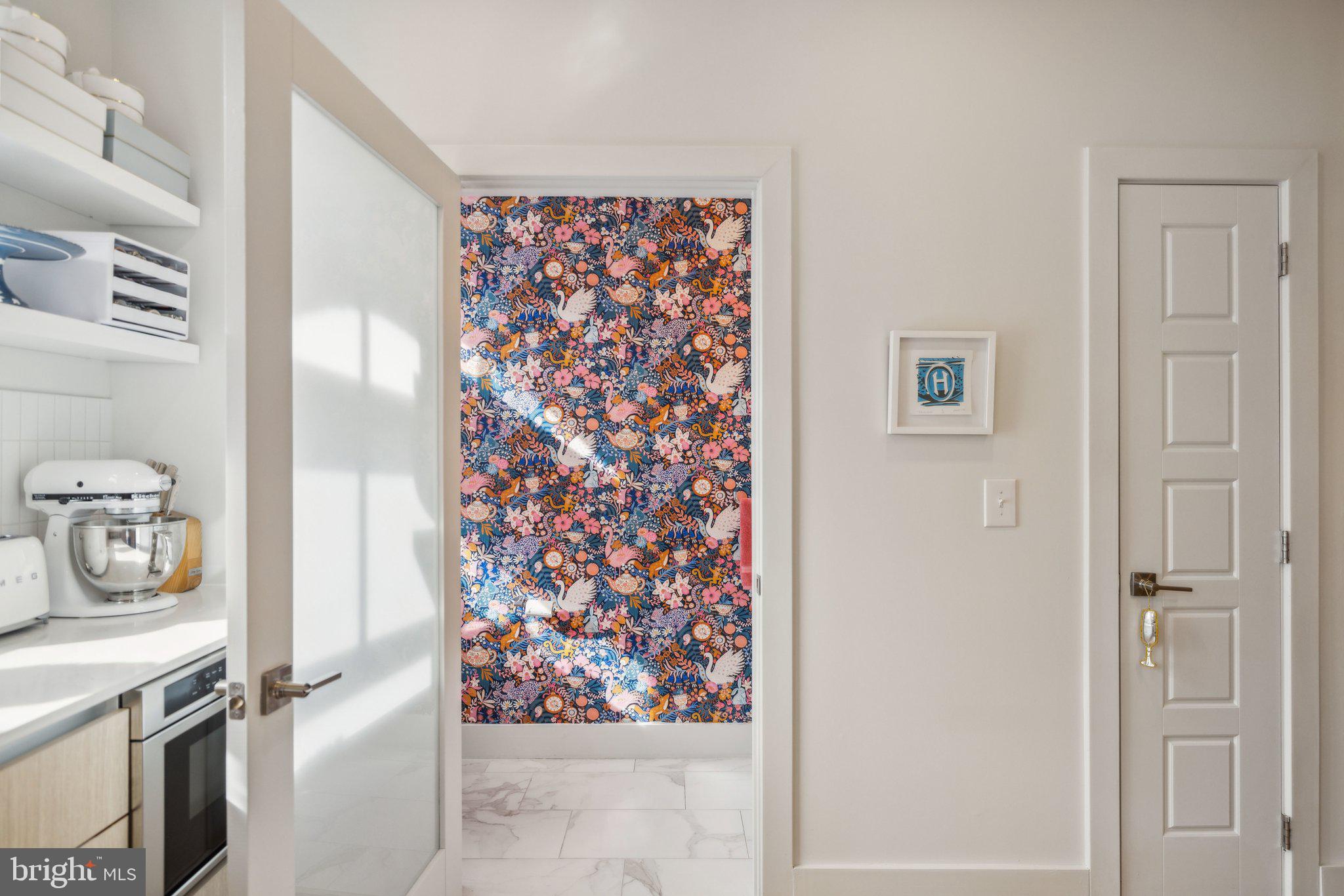 1309 E Street Southeast, Unit 36 Washington, DC 20003 - Photo 7 of 36 a kitchen with stainless steel appliances granite countertop a refrigerator and a stove