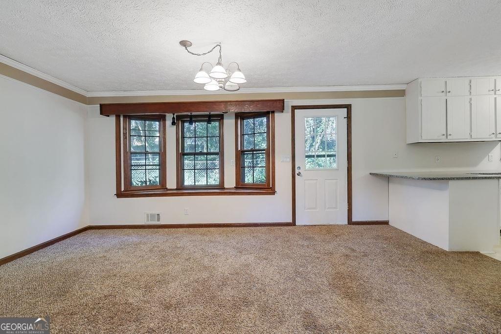 2733 Old Dawsonville Road Gainesville, GA 30506 - Photo 11 of 40 a view of an empty room with a window