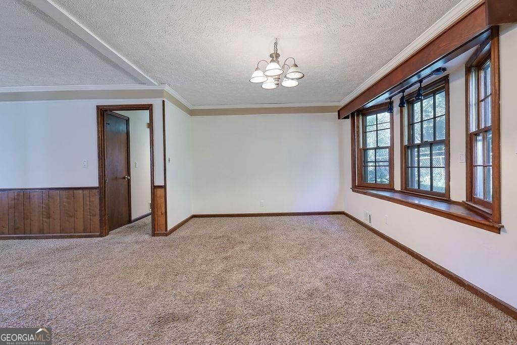 2733 Old Dawsonville Road Gainesville, GA 30506 - Photo 12 of 40 a view of an empty room with a window