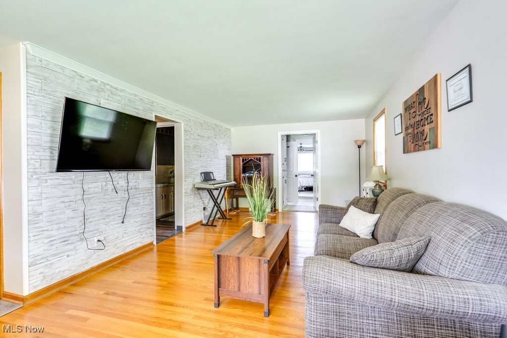 5867 Wiclif Road Northeast Canton, OH 44721 - Photo 6 of 45 Living room featuring light wood-type flooring and baseboards