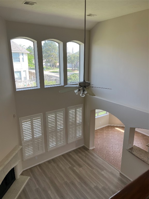 902 Brandy Street Stafford, TX 77477 - Photo 15 of 21 a view of empty room with wooden floor and fan