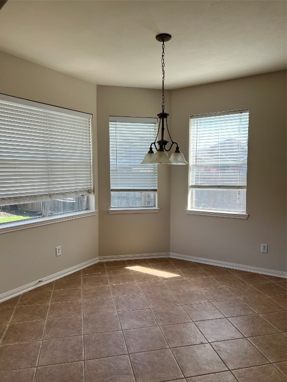 902 Brandy Street Stafford, TX 77477 - Photo 7 of 21 a view of an empty room with a window