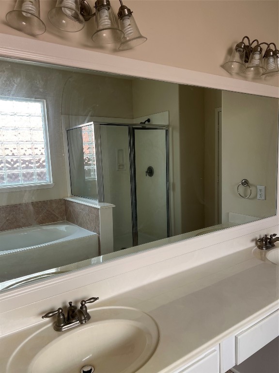 902 Brandy Street Stafford, TX 77477 - Photo 9 of 21 a bathroom with a sink and a bathtub