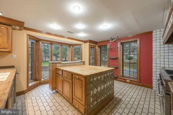 a kitchen with a stove and a sink