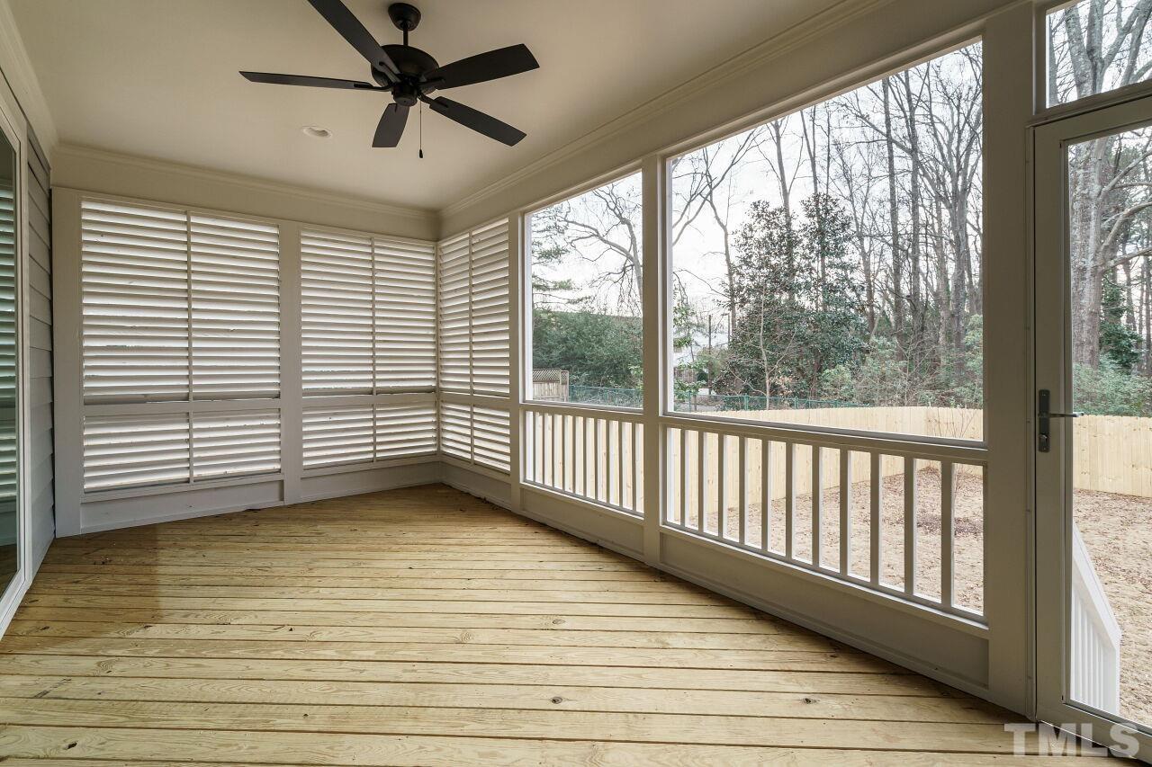 171 Adams Street Cary, NC 27513 - Photo 30 of 32 a view of a room with window and a ceiling fan