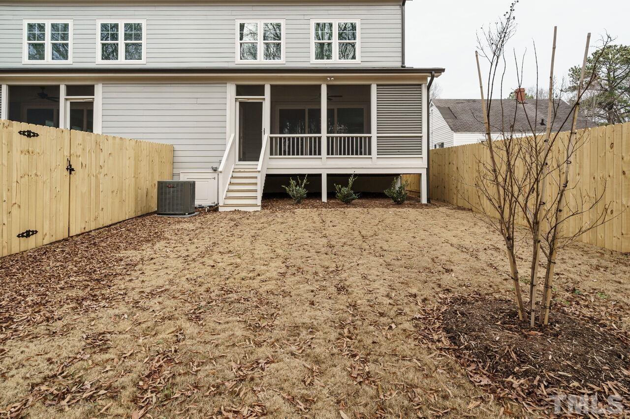 171 Adams Street Cary, NC 27513 - Photo 32 of 32 a front view of a house with a yard
