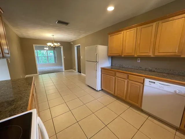 a view of a kitchen with a sink