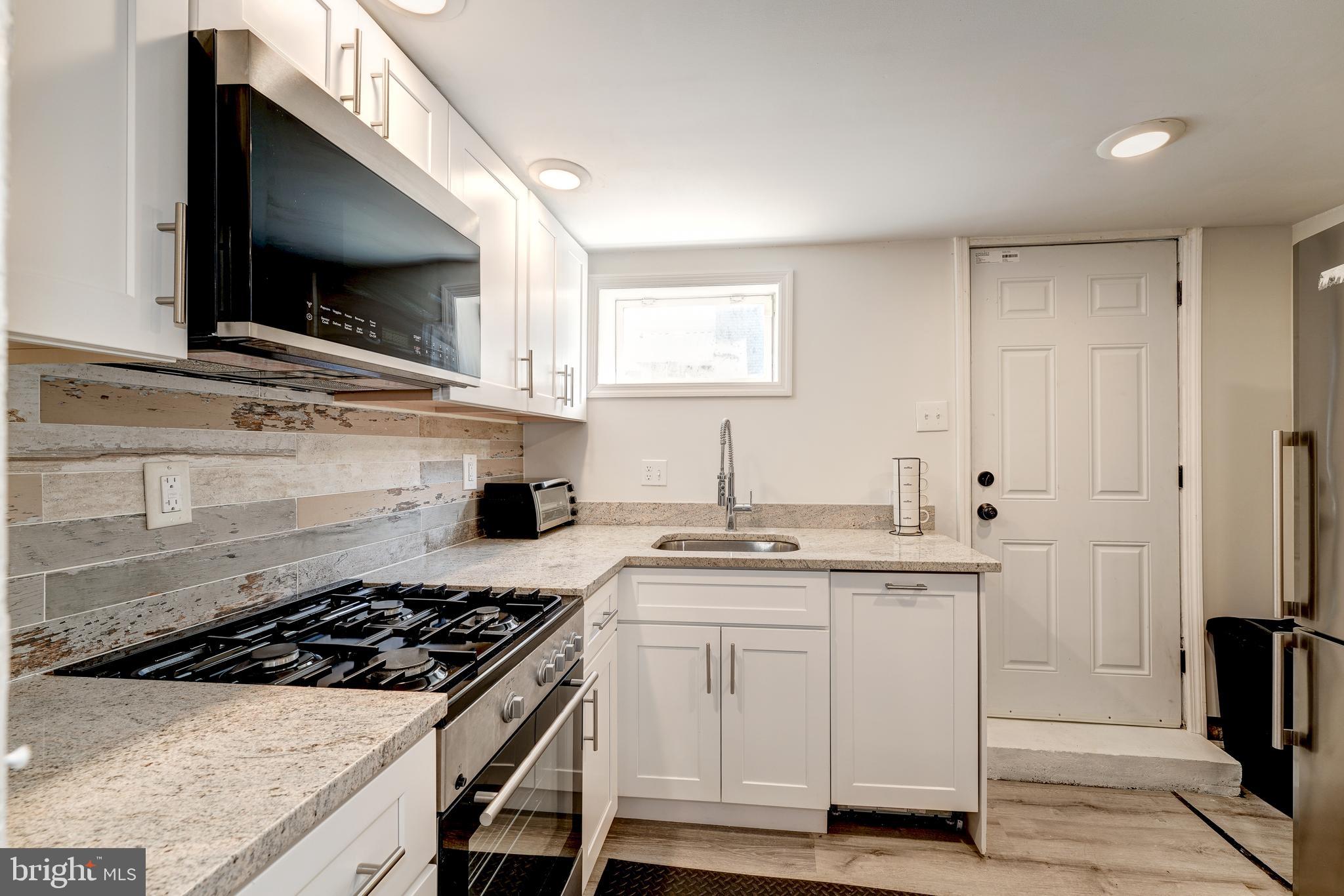 2339 3rd Street Northeast Washington, DC 20002 - Photo 28 of 59 Microwave,disposal,dishwasher&gas stove!