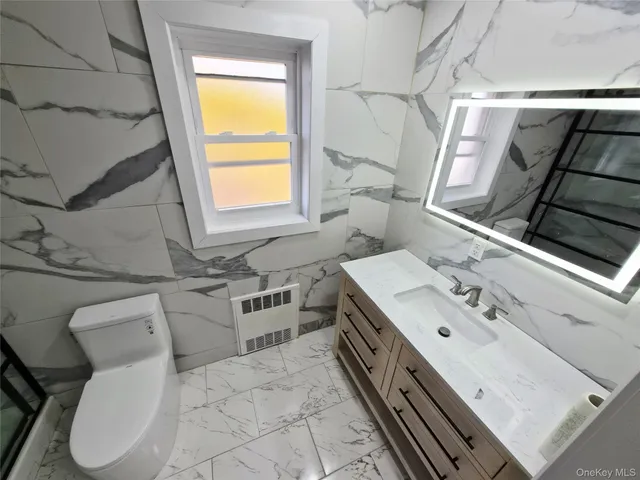 $1,549,000 | 80-19 Utopia Parkway | Jamaica Estates