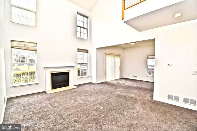 a view of a livingroom with a fireplace