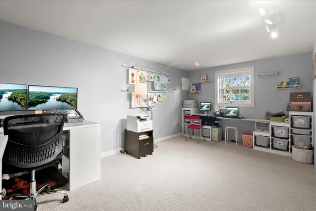 a room with furniture a washer and dryer