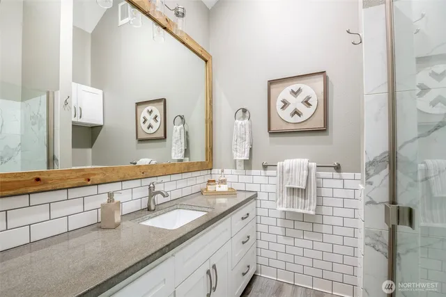 a view of a bedroom with closet and cabinet