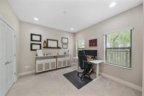 1824 Bonner Street Houston, TX 77007 - Photo 34 of 39 a view of a workspace with furniture and a window