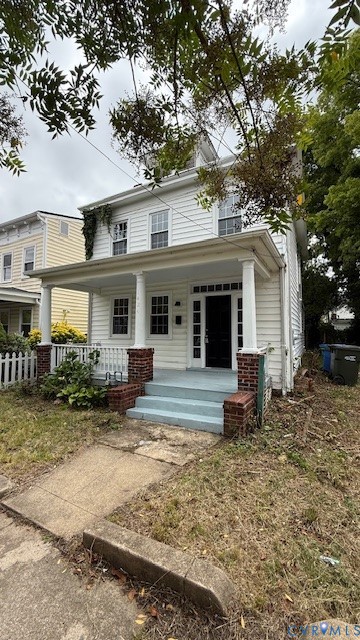 1424 Decatur Street Richmond, VA 23224 - Photo 1 of 28 White siding exterior with a covered front porch,