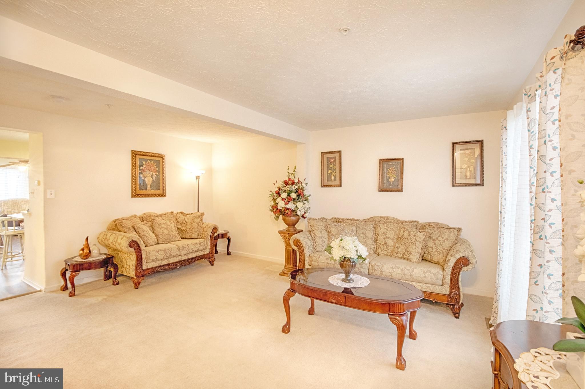 5034 Finsbury Road Baltimore, MD 21237 - Photo 2 of 23 Living room at entry w double window at front