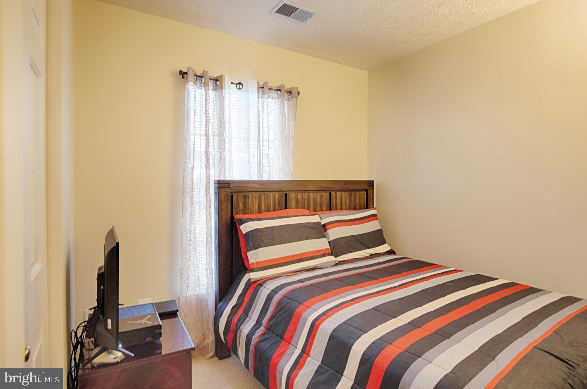 5034 Finsbury Road Baltimore, MD 21237 - Photo 15 of 23 Third bedroom w one window & nice closet