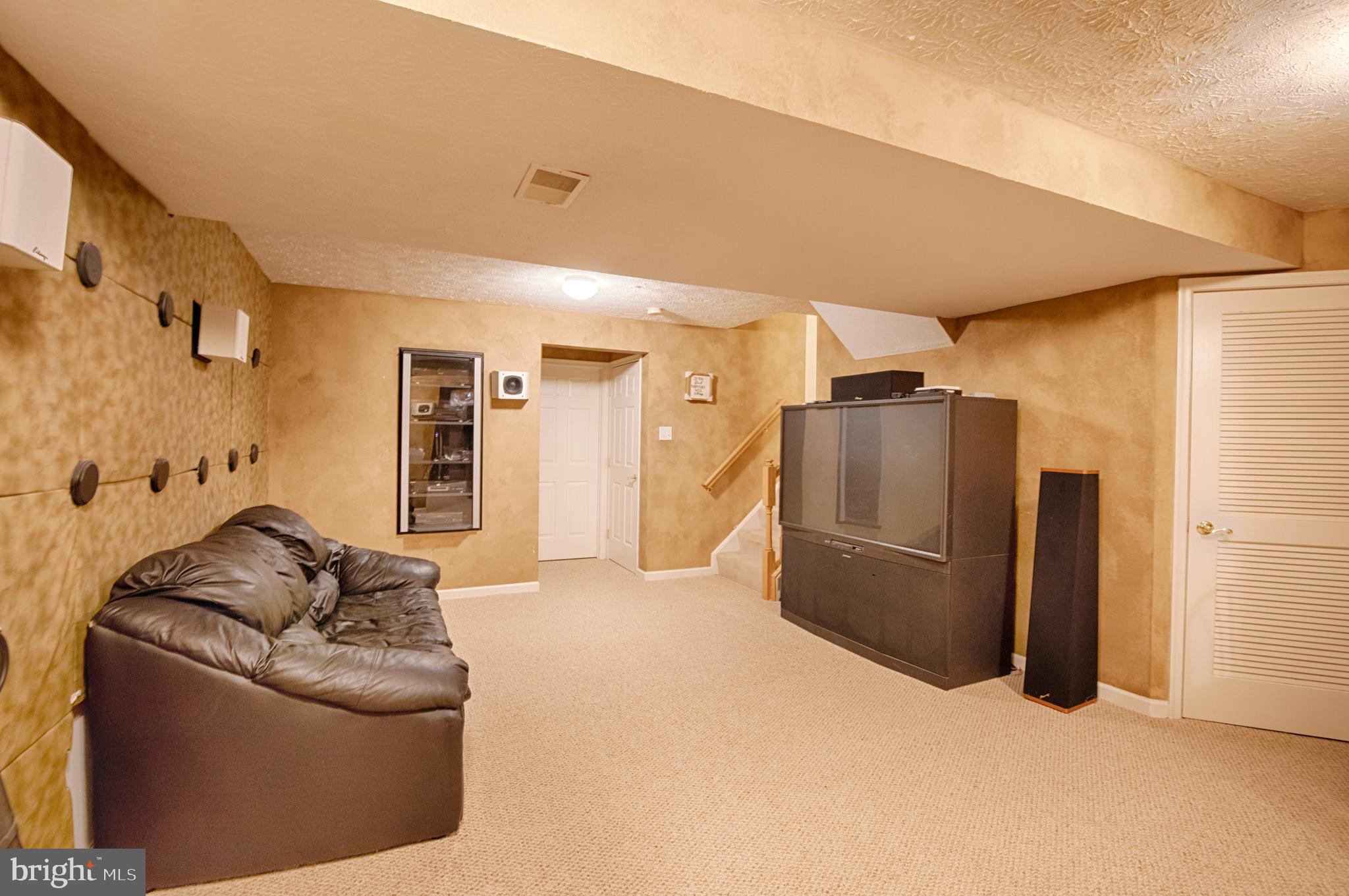 5034 Finsbury Road Baltimore, MD 21237 - Photo 18 of 23 Great flexible family space w soundproof wall!