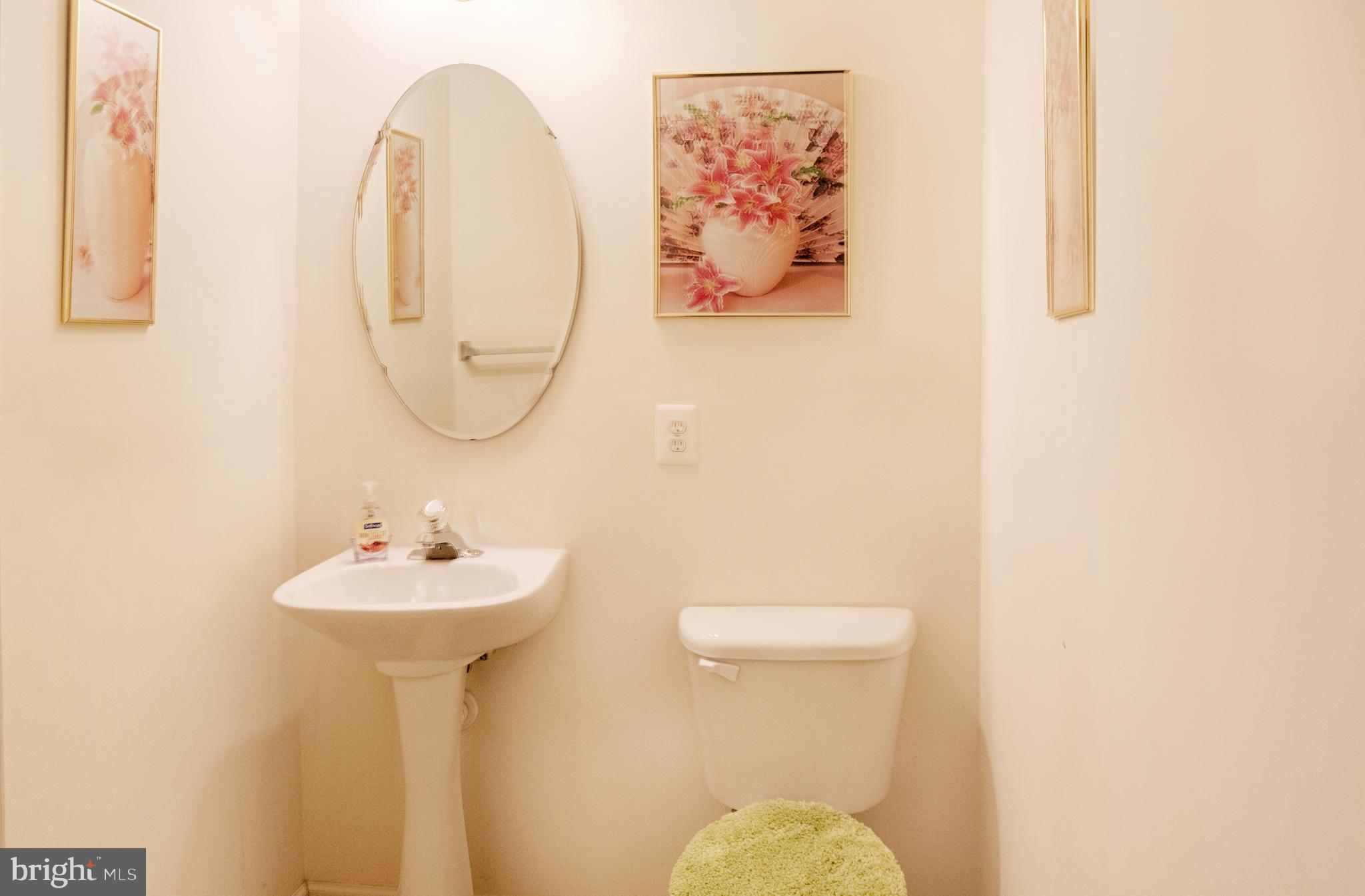 5034 Finsbury Road Baltimore, MD 21237 - Photo 8 of 23 Convenient main level powder room