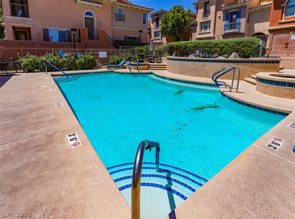 9940 Sable Point Street Las Vegas, NV 89178 - Photo 35 of 40 Community pool featuring a residential view