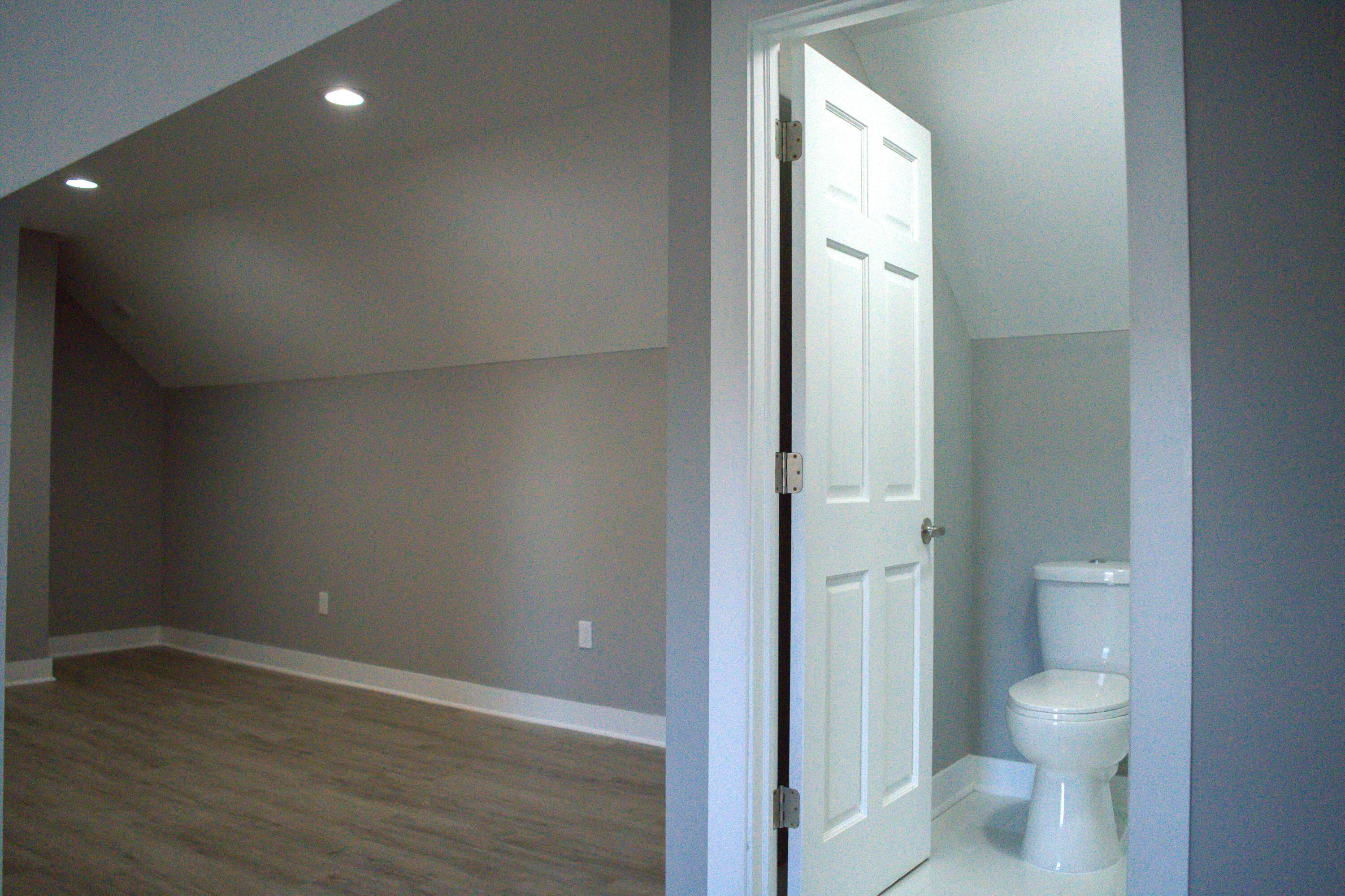 864 Ohio Street Gary, IN 46402 - Photo 13 of 27 a bathroom with a toilet sink and shower
