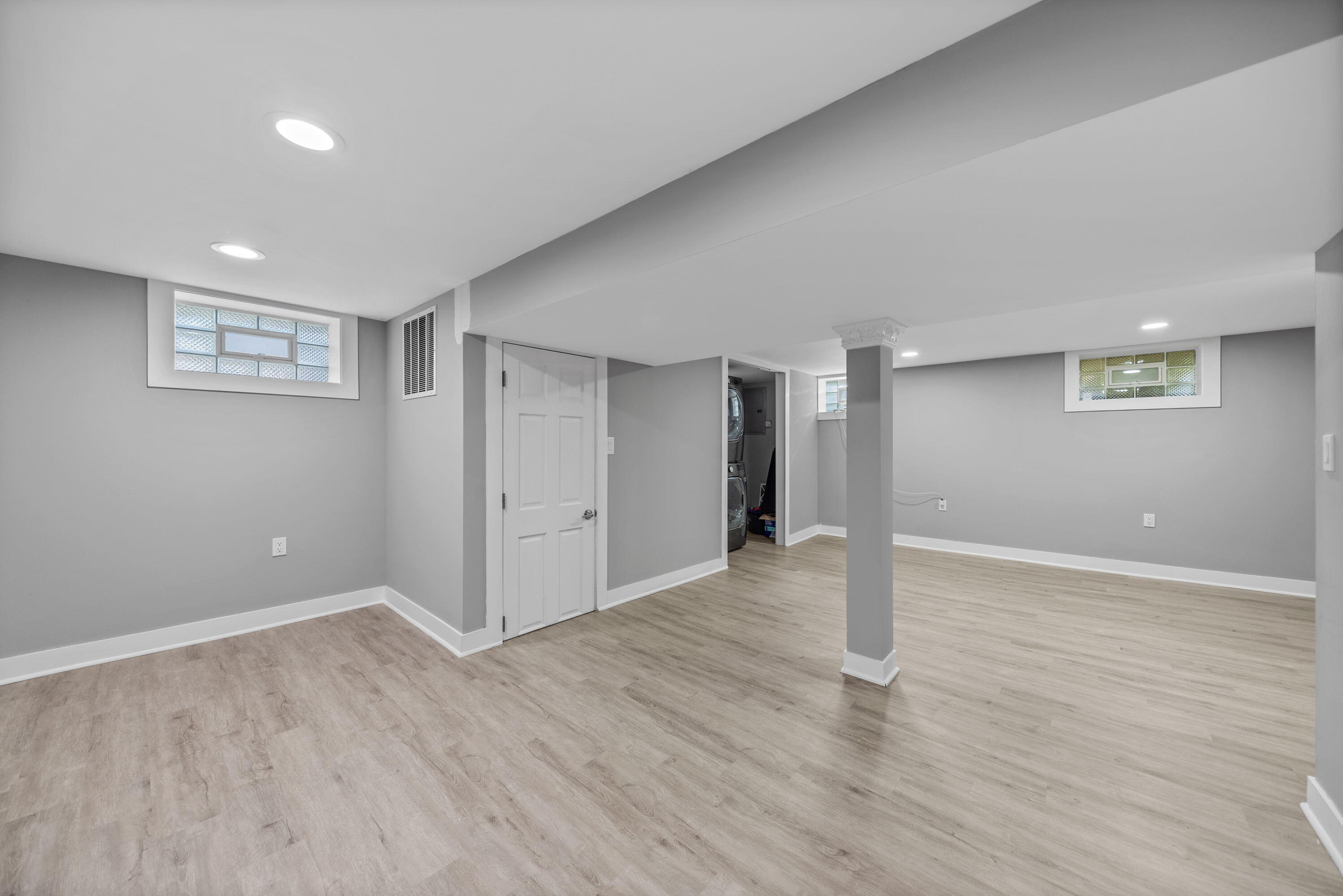 864 Ohio Street Gary, IN 46402 - Photo 18 of 27 a view of an empty room with wooden floor and closet