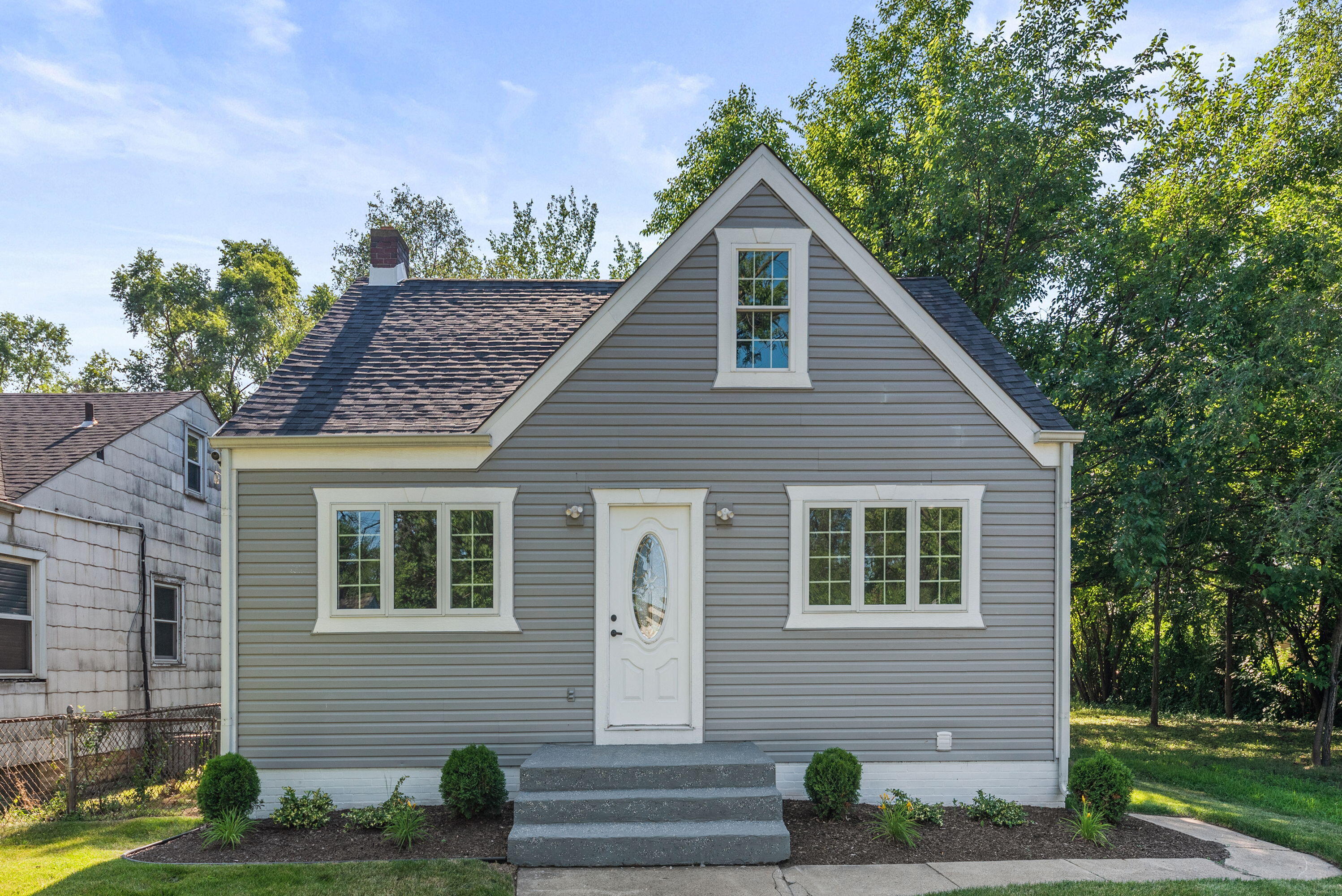 864 Ohio Street Gary, IN 46402 - Photo 2 of 27 a view of a house with a yard