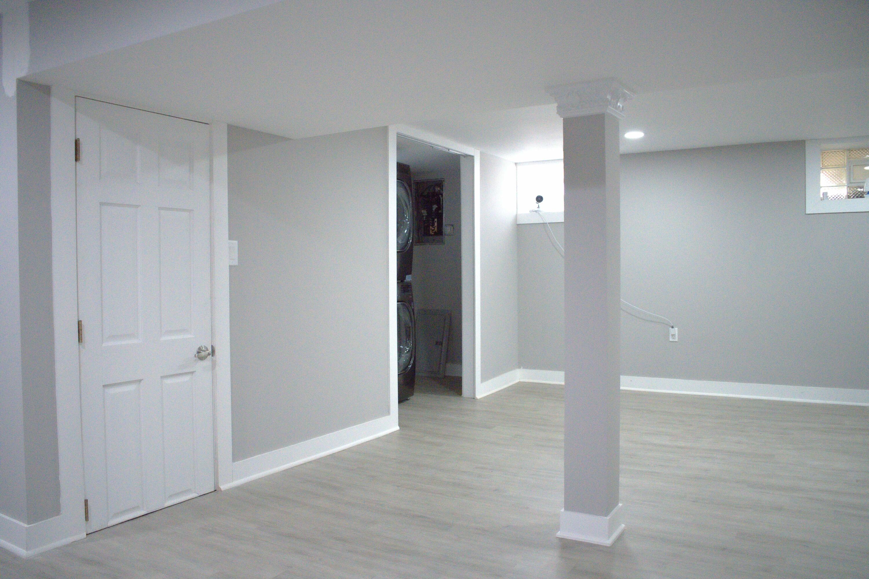 864 Ohio Street Gary, IN 46402 - Photo 22 of 27 a view of an empty room with wooden floor