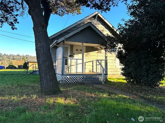 a backyard of a house with lots of green space
