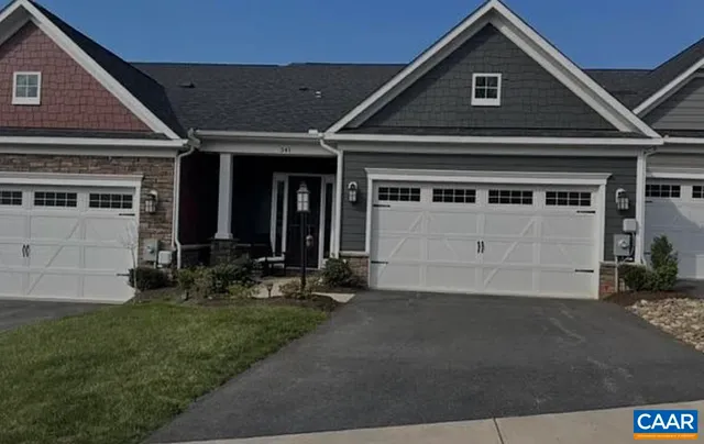 a view of kitchen with livingroom and window