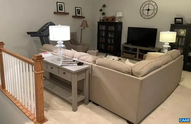 a view of a chair and table in backyard