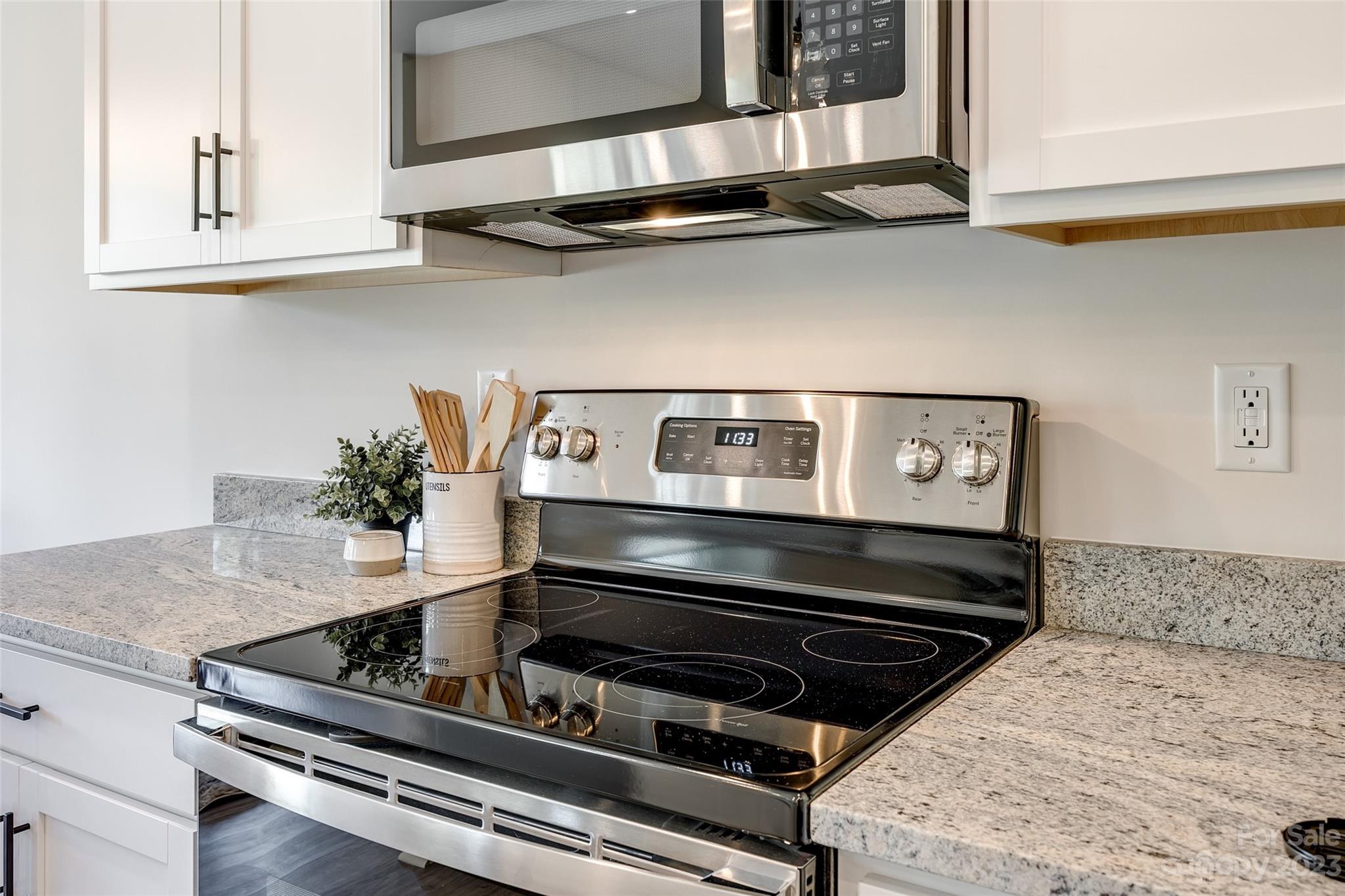 2209 State Rd S-46-1474, Unit 14 Clover, SC 29710 - Photo 15 of 33 a stove top oven sitting inside of a kitchen